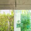 Roman blind curtain decoration in living room interior