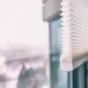 Home blinds - cordless cellular honeycomb pleated shade modern shades on apartment windows. Automated curtains blind.